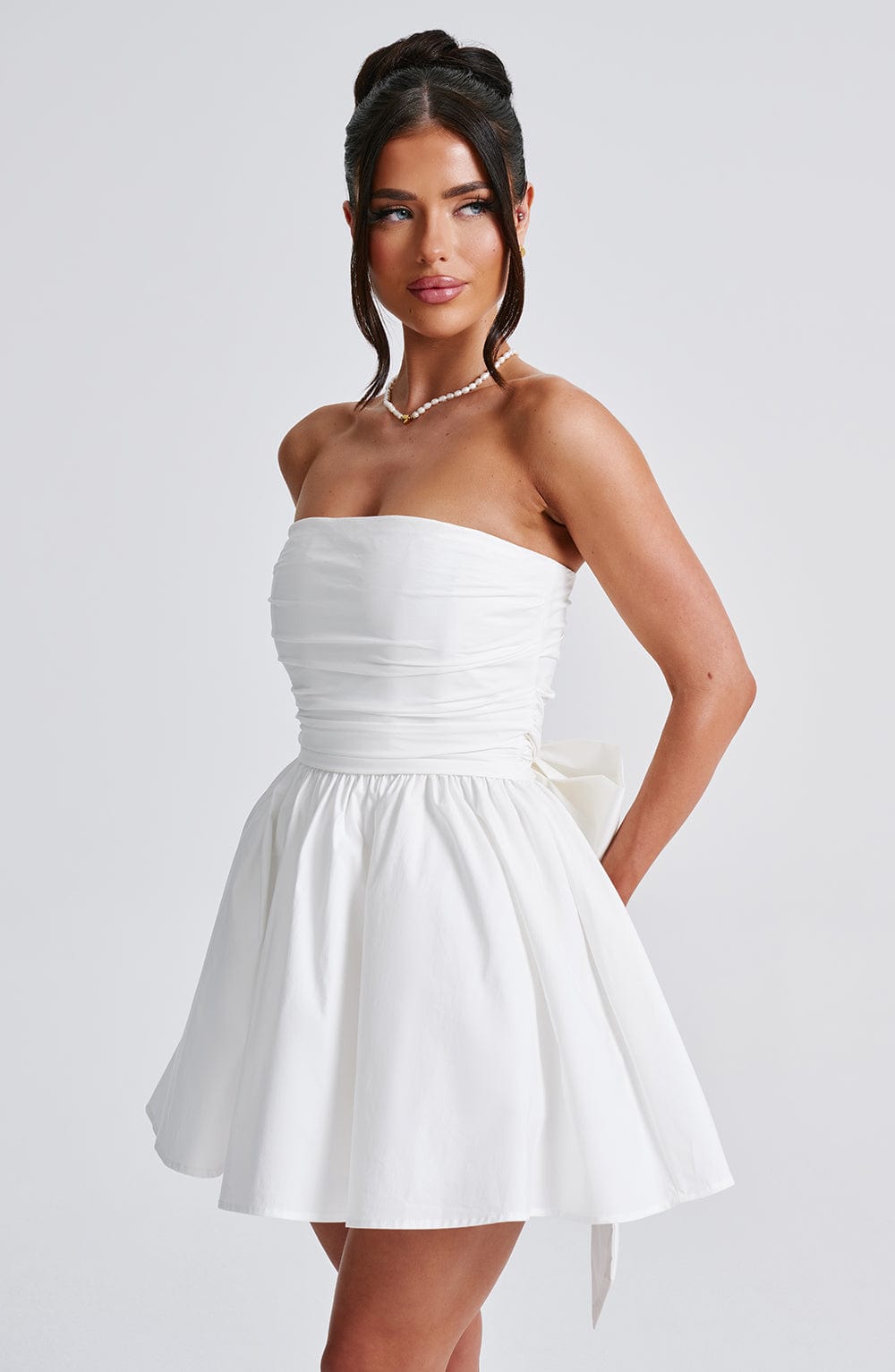 Katrina - Ivory strapless ruched full skirt mini dress