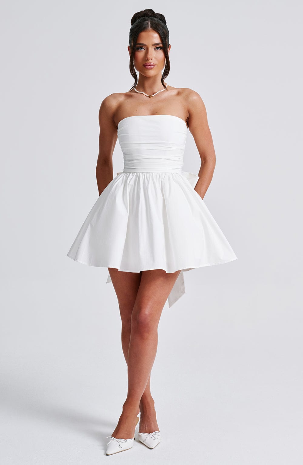 Katrina - Ivory strapless ruched full skirt mini dress