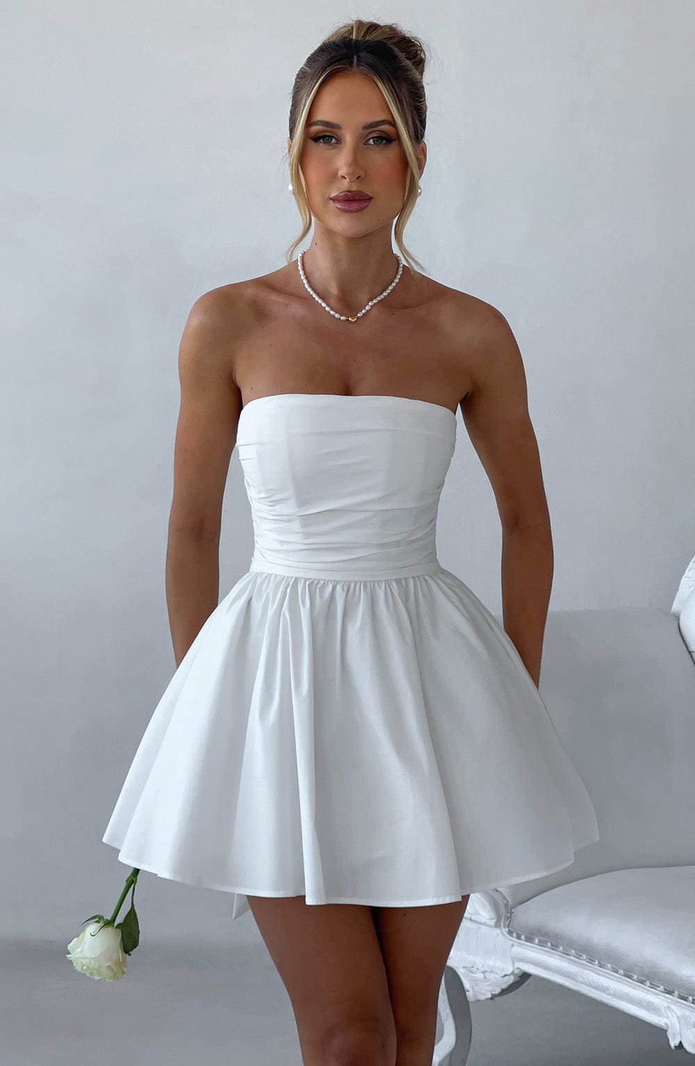 Katrina - Ivory strapless ruched full skirt mini dress