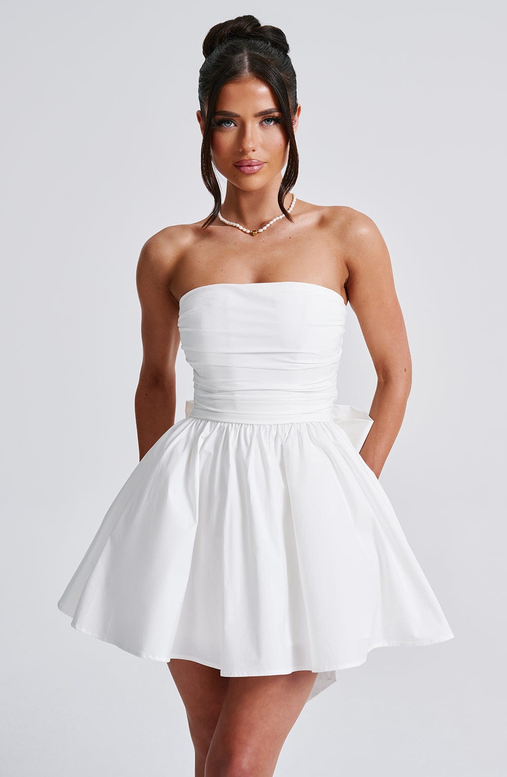 Katrina - Ivory strapless ruched full skirt mini dress