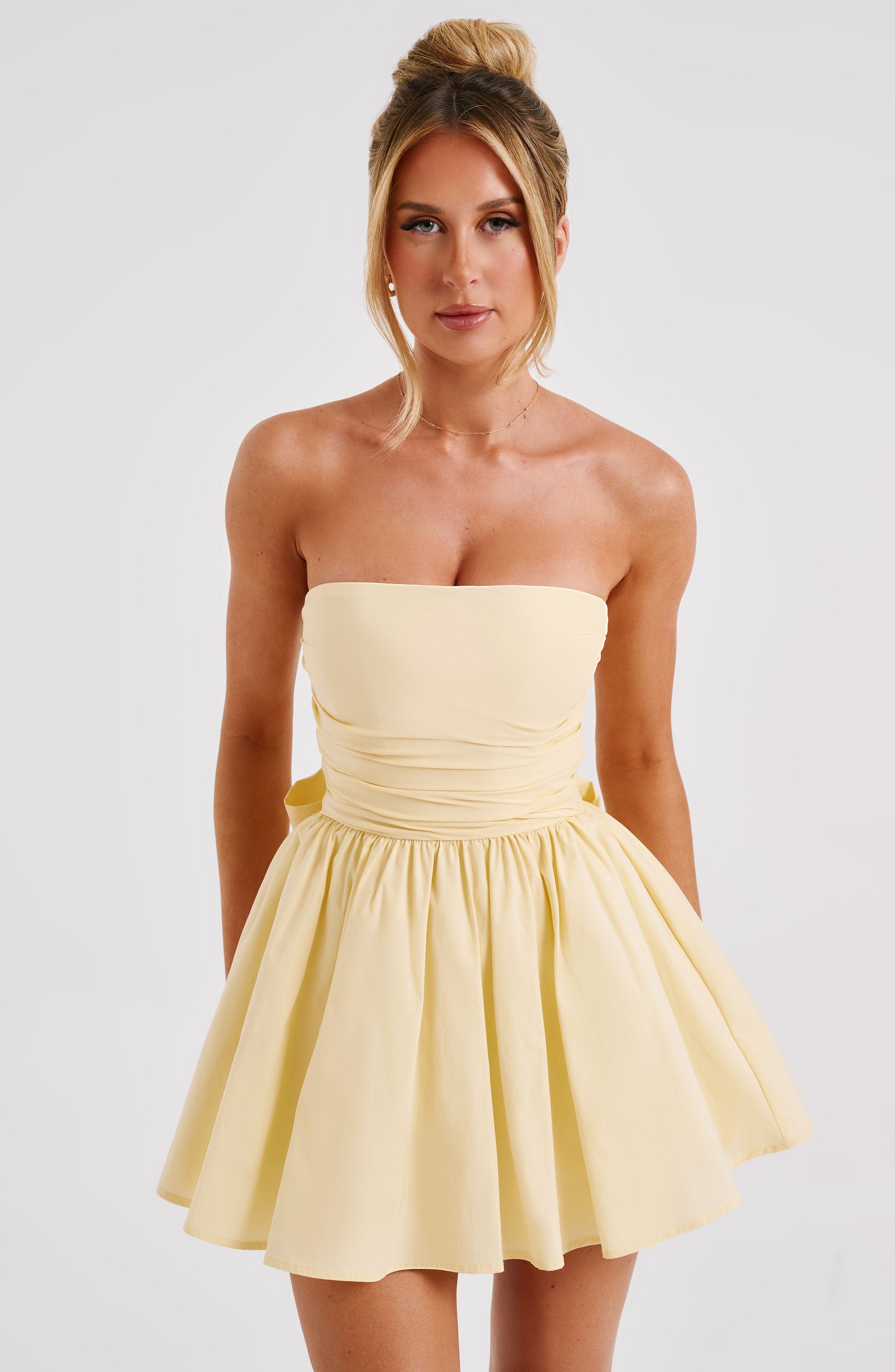 Katrina - Lemon strapless ruched mini dress with bow
