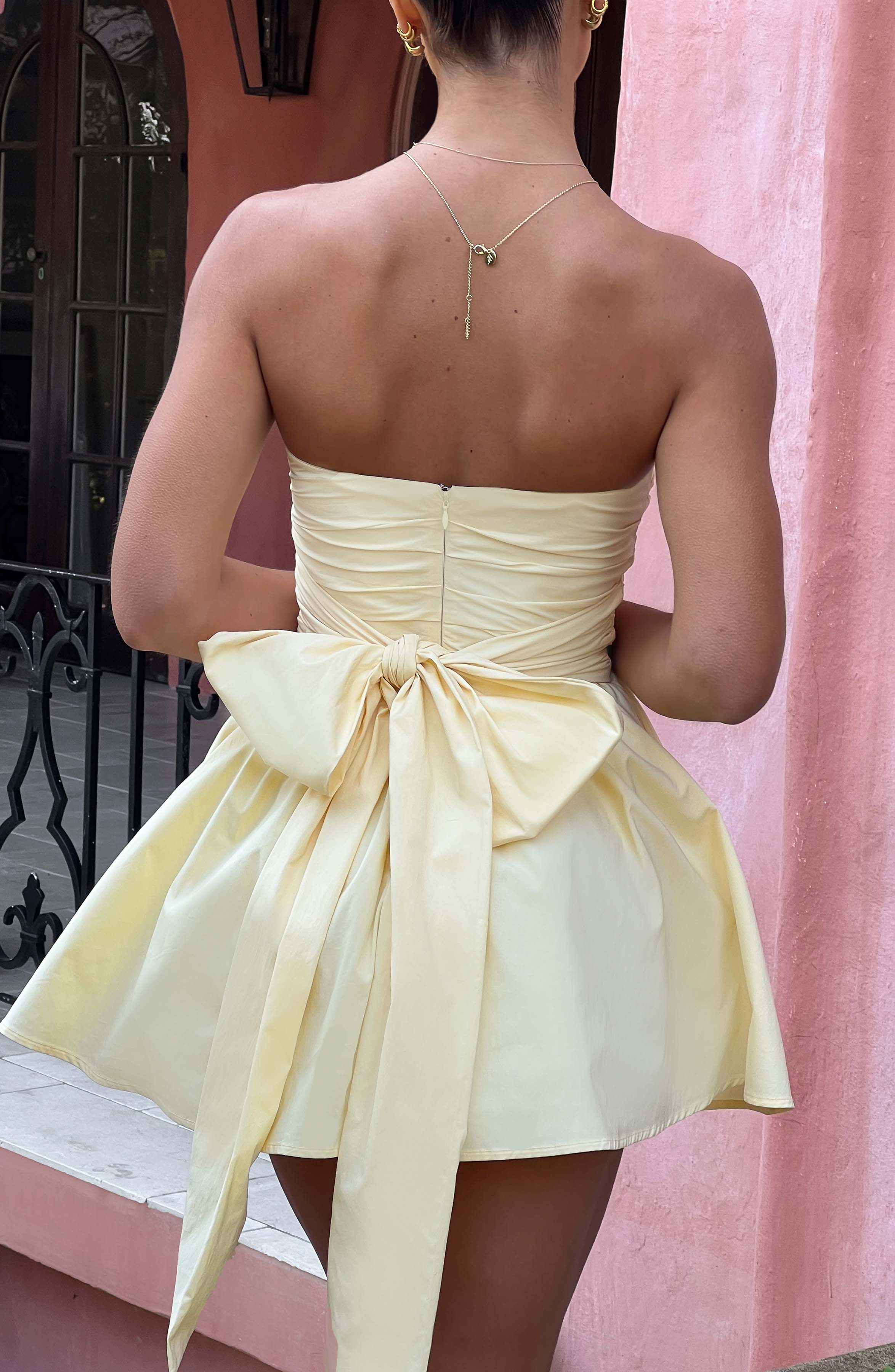 Katrina - Lemon strapless ruched mini dress with bow