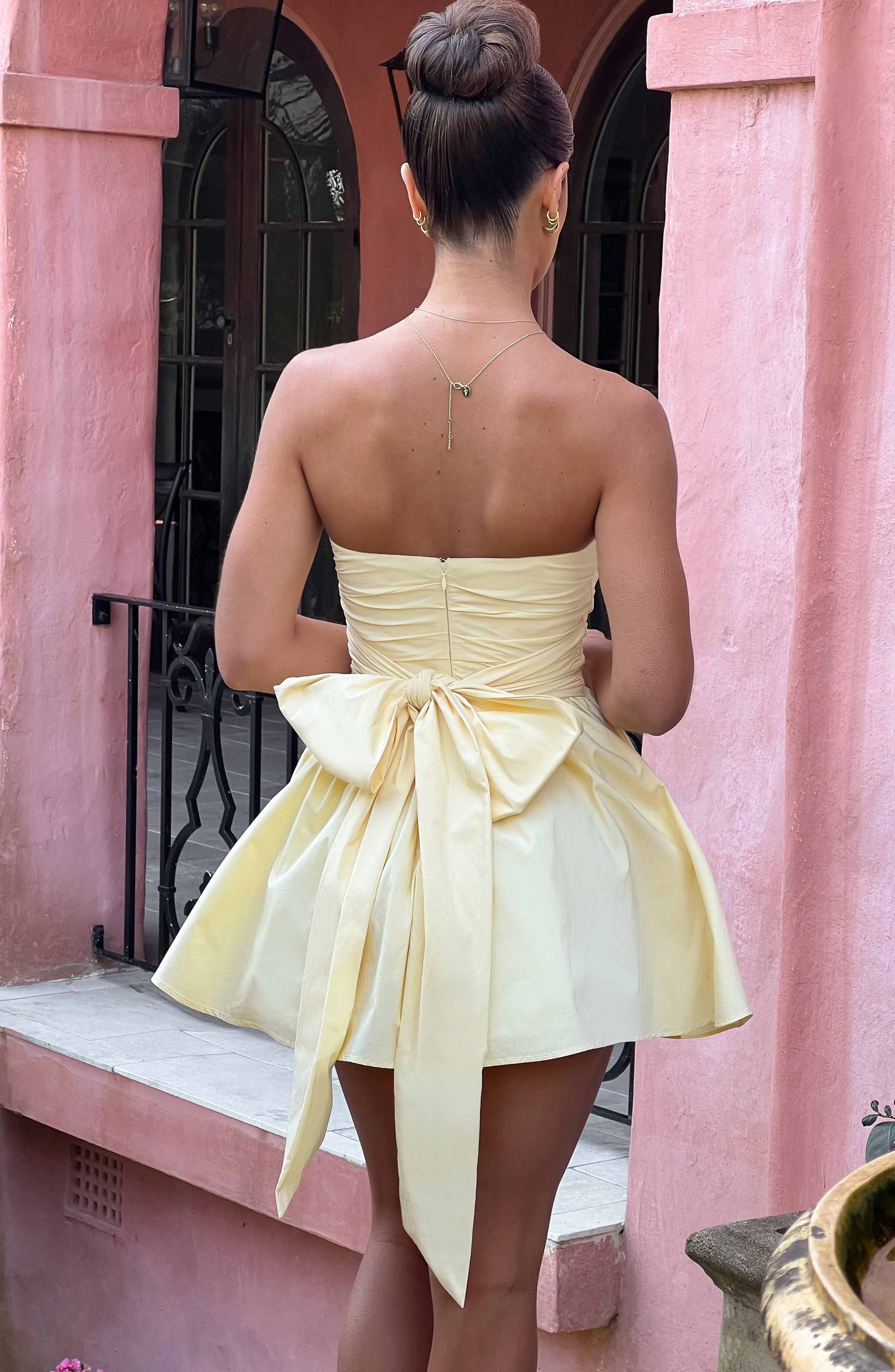 Katrina - Lemon strapless ruched mini dress with bow