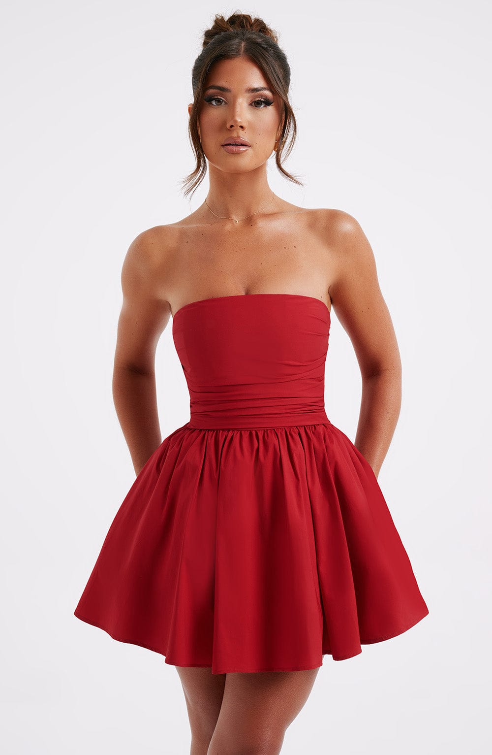 Katrina - Red strapless ruched mini dress with bow