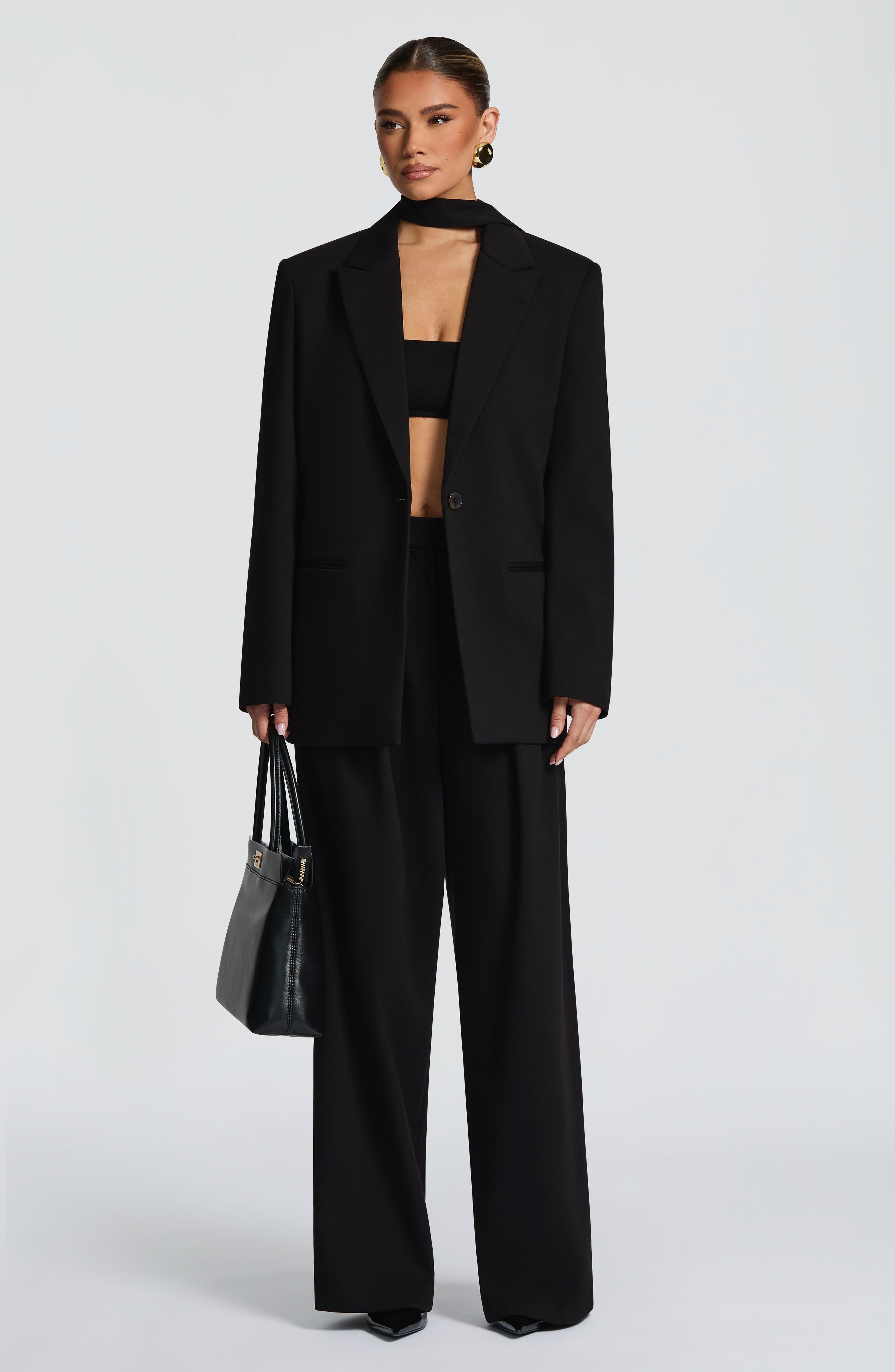 Kirsty - Black pleated low-rise wide-leg trousers