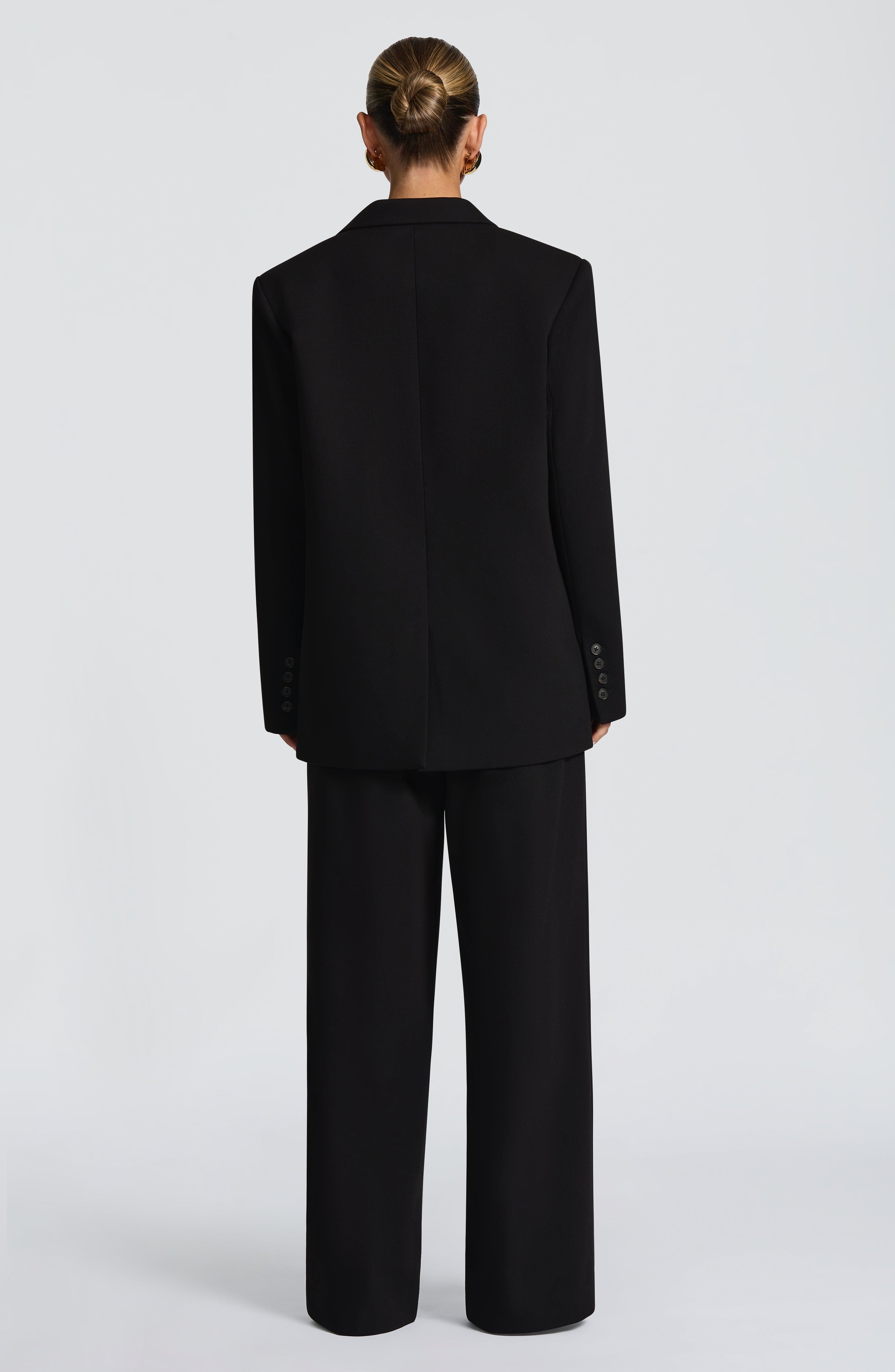 Kirsty - Black pleated low-rise wide-leg trousers