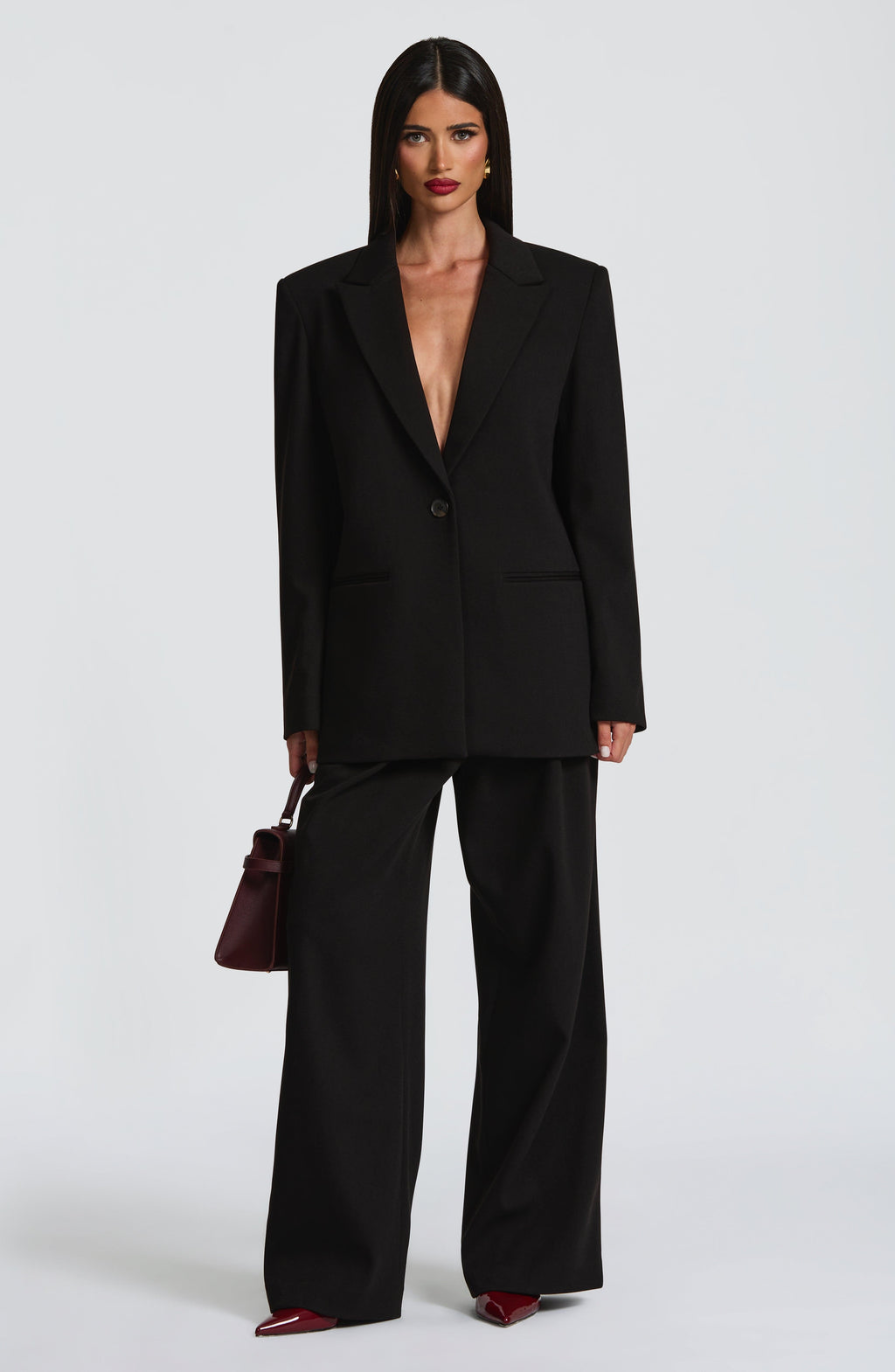 Kirsty - Black pleated low-rise wide-leg trousers