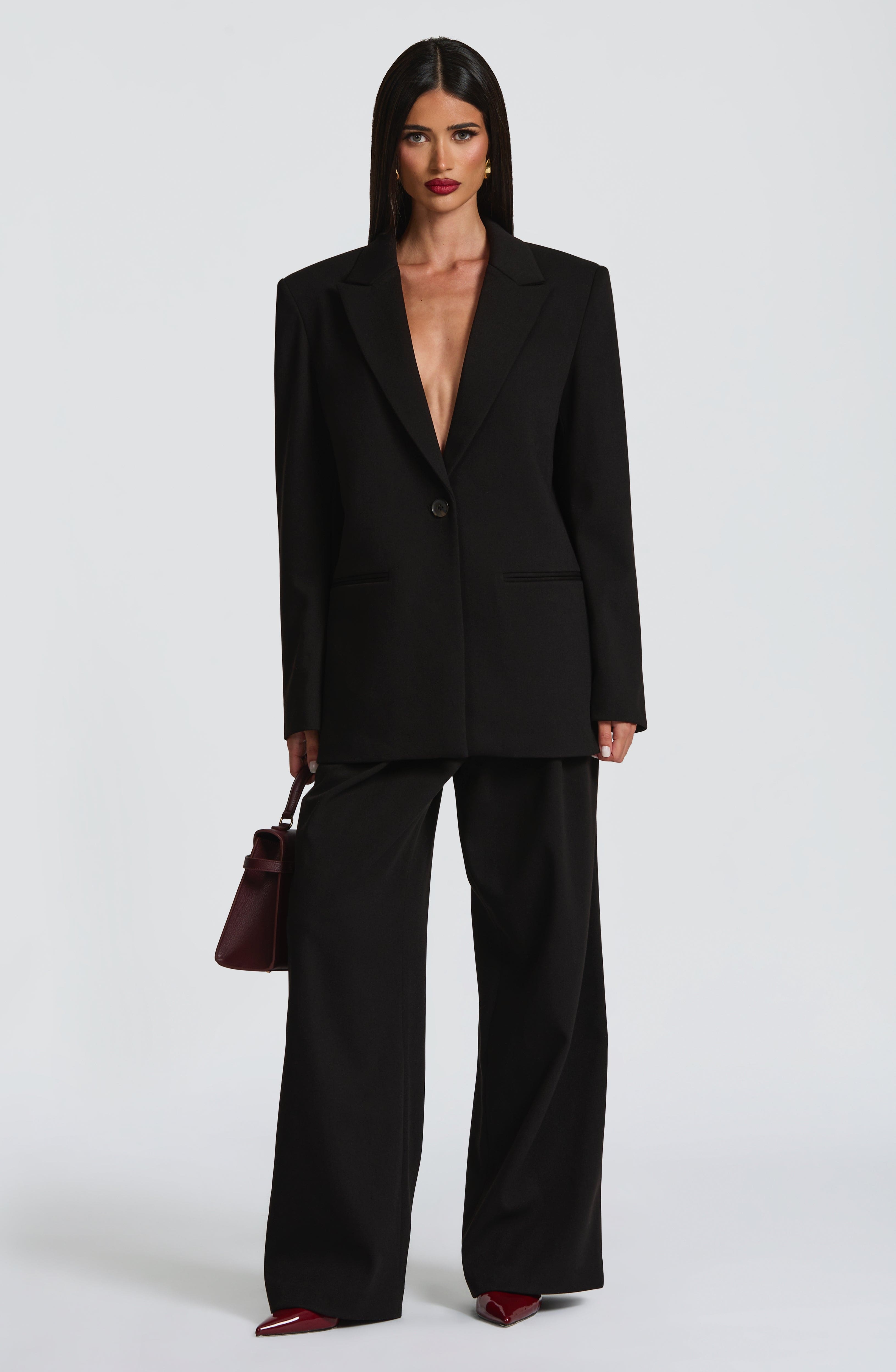 Kirsty - Black pleated low-rise wide-leg trousers